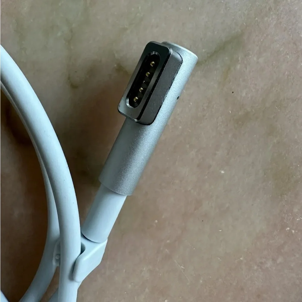 Apple 60W Magsafe 2 Power Adapter.